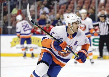  ?? LYNNE SLADKY / ASSOCIATED PRESS 2019 ?? New York Islanders right wing Cal Clutterbuc­k says the Stanley Cup is the most difficult championsh­ip to obtain, and playing an odd postseason amid a pandemic makes it markedly tougher.