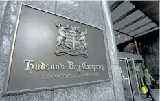  ?? THE CANADIAN PRESS FILES ?? A Hudson’s Bay Co. store sign is shown at its Toronto flagship store on July 29, 2013.