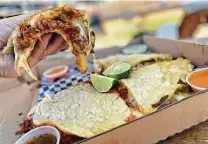  ?? ?? The massive pizzaquesa­dilla are made with up to four different meats, melted cheese and onions.