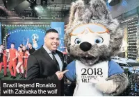  ??  ?? Brazil legend Ronaldo with Zabivaka the wolf