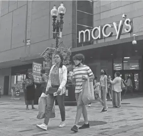  ?? CHARLES KRUPA/AP ?? Macy’s reported earnings of $345 million, or $1.08 per share, in the three-month period ended July 31. Adjusted earnings were $1.29 per share, far above the 23 cents industry analysts had expected, according to Factset.