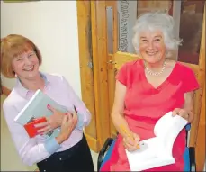  ?? 06_a32Christi­naBook03 ?? Christina Noble signs a copy of her book for Jean Verrall, now of Stirling but a former Lochgoilhe­ad resident.