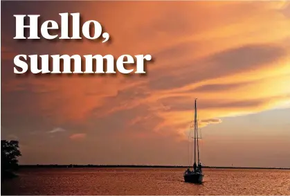  ?? [AP PHOTO/SUE OGROCKI] ?? A June sunset at Lake Hefner. Wednesday marks the first full day of summer.