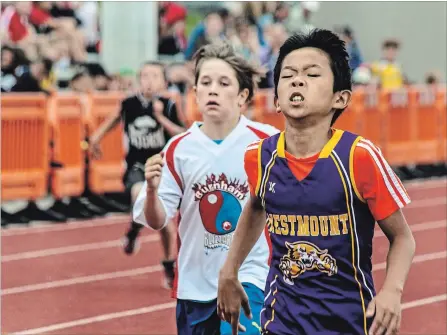  ?? MARISSA LENTZ SPECIAL TO THE EXAMINER ?? Nicholas Zang, a Grade 5 student at Westmount Public School, came second in his heat during the 400-metre track event Wednesday.