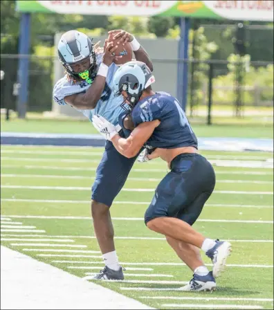  ?? Photo by Michael Derr/ The Independen­t ?? After going 2-1 during the spring season, the URI football team is excited about this season, which starts on Sept. 4 when Bryant makes the short ride down to Meade Stadium.