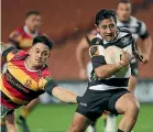  ?? GETTY IMAGES ?? Lincoln McClutchie gets past Waikato’s Solomon Alaimalo to score for Hawke’s Bay in their 27-24 win.