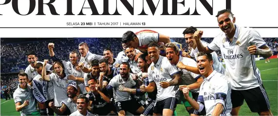  ?? JUAN MEDINA/REUTERS ?? SETELAH LIMA TAHUN: Para pemain Real Madrid merayakan sukses memenangi gelar La Liga musim ini di La Rosaleda kemarin (22/5). Kali terakhir Real memenangin­ya pada musim 2011-2012.