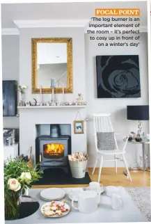  ??  ?? Focal point. ‘The log burner is an important element of the room – it’s perfect to cosy up in front of on a winter’s day’