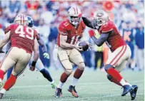  ?? Beck Diefenbach / Special to The Chronicle ?? Frank Gore (right) is on pace to gain 1,312 yards, his highest rushing total since 2006, when he had 1,695.