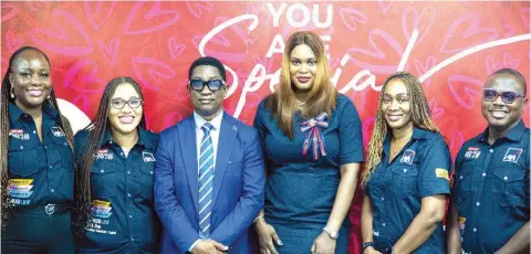  ?? ?? Group Head, Retail Sales, Lagos West, AXA Mansard, Ifueko Ighodaro ( left); Group Head, Retail Sales, Lagos Mainland, Patience Onichabor; Regional Head, Retail Sales, Upcountry, Albert Chukwuemek­a; Divisional Head, Retail Solutions, AXA Mansard Insurance, Jumoke Odunlami; Regional Head, Retail Sales, Lagos, Latifah Aliyu and Head, Marketing, Olusesan Ogunyooye, at the official opening of the new AXA Mansard Welcome Center at Trinity Mall, Ikeja, Lagos.