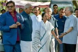  ?? — PTI ?? BJP MP Shatrughan Sinha, former Union ministers Yashwant Sinha and Arun Shourie with West Bengal CM Mamata Banerjee before a meeting at the TMC party office in New Delhi on Wednesday.
