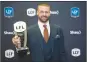  ?? Canadian Press photo ?? Edmonton Eskimos quarterbac­k Mike Reilly, recipient of the Most Outstandin­g Player award, poses backstage at the CFL awards in Ottawa on Thursday.