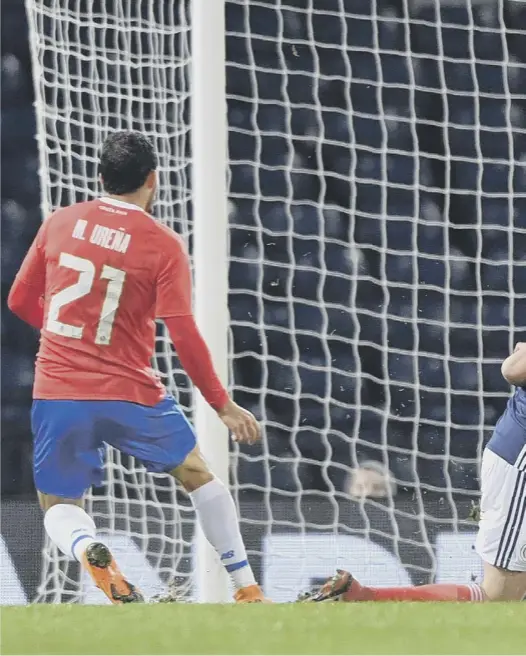  ??  ?? Scotland captain Charlie Mulgrew and goalkeeper Allan Mcgregor are unable to stop Costa Rica’s Marcos Urena scoring the only goal at Hampden Park last night in the first match of manager Alex Mcleish’s second spell in charge of the national team.