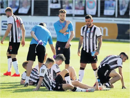 ??  ?? Bath City players look dejected after the final whistle