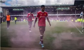  ?? Photograph: Ash Donelon/Manchester United/Getty Images ?? Marcus Rashford walks off after Manchester United’s defeat at relegation-threatened Everton this month.