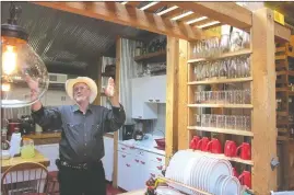  ?? PHOTO COURTESY ABBY BURNETT ?? The McCollough­s’ house, which took them four years to build, is “basically a pole barn” according to T.J., one that features immense cedar logs harvested from their property, glass blocks and a cheery red floor.