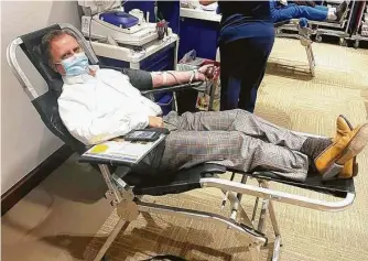  ?? HCA ?? Jim Brown, CEO at HCA Houston Healthcare North Cypress, donates blood Wednesday. The hospital hosted an employee blood drive to help replenish the low blood-supply levels.