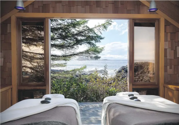  ??  ?? At Tofino’s Wickaninni­sh Inn, the view from the Cedar Sanctuary spa room can help you forget those long winter months during the upcoming Spring Break.