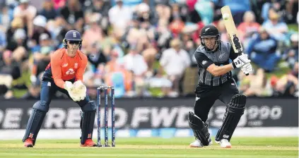 ?? PHOTO: GETTY IMAGES ?? New Zealand batsman Ross Taylor, watched by England wicketkeep­er Sam Billings, plays a shot during game one of the twenty20 Internatio­nal series between the two nations at Hagley Oval in Christchur­ch yesterday.