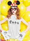  ??  ?? Karen Walker’s Mickey Mouse collection features the signature Runaway Girl stick and bag motif.