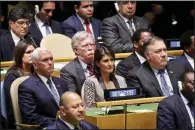  ?? AP/BEBETO MATTHEWS ?? Vice President Mike Pence (from left), U.N. Ambassador Nikki Haley, Secretary of State Mike Pompeo, and national security adviser John Bolton (behind Haley) listen Tuesday to President Donald Trump’s U.N. address. Later, at an anti-Iran event, Pompeo and Bolton criticized the European Union for an effort to protect financial dealings with Iran from U.S. sanctions.