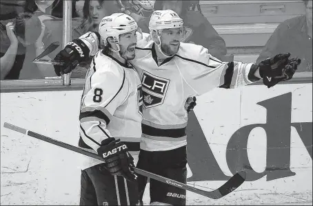  ?? ASSOCIATED PRESS ?? MARK J. TERRILL Marian Gaborik, right, of the Kings celebrates his goal in Game 7 against the Ducks with teammate Drew Doughty. Gaborik, a former Blue Jacket, has nine goals and six assists in 14 playoff games.