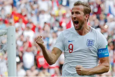  ??  ?? GET IN THERE: Harry Kane became the third England player to score a hat-trick at a World Cup yesterday. AP
