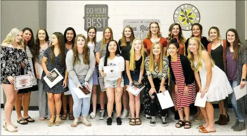  ?? TIMES photograph by Annette Beard ?? Blakelee Winn and Cassidy Mooneyhan were named MVPs for Lady Blackhawk track by coach Heather Wade during the spring athletic awards ceremony.