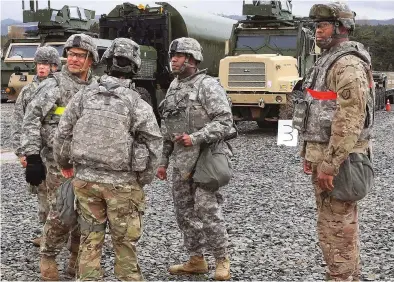  ??  ?? Tension: US soldiers at a base in Pohang, South Korea, near the North Korea border, this week