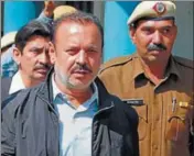 ?? PTI ?? Former Haryana CPS Ram Kishan Gujjar being produced in a court in Ambala on Thursday.
