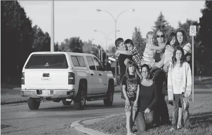  ?? JAMES PARK / OTTAWA CITIZEN ?? From left, Amanda Jung and her son Brody, Tanya Brunette and daughter Marissa Turcotte, Julie Woito and daughter Kaylana, Jeannine Crate and daughters Terri-Jean and Jessica Luchuck, at uncontroll­ed intersecti­on of Craig Henry Dr. and Bertona St.