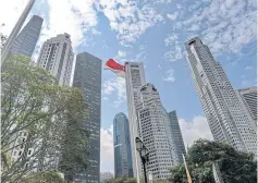  ?? AFP ?? Singapore’s economic growth will dip to close to 2% this year after the city state avoided a technical recession, with a further slowdown expected next year.