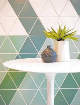  ?? Walker Zanger ?? The modern, retro feel of Kaleidosco­pe, a collection of porcelain tiles from Walker Zanger, encourages both designers and homeowners to express their personalit­y by using a playful combinatio­n of colors and patterns on walls and floors.