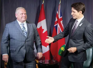  ?? PAUL CHIASSON/THE CANADIAN PRESS ?? Ontario Premier Doug Ford is apparently prepared to walk out of Friday’s First Ministers’ meeting in Montreal if it doesn’t specifical­ly deal with Prime Minister Justin Trudeau’s proposal on the carbon tax.