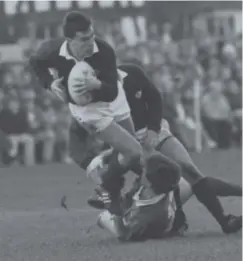  ??  ?? 0 Iwan Tukalo in action during Scotland’s 13-10 win against Ireland at Lansdowne Road in the 1990 Grand Slam-winning campaign.