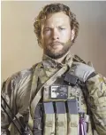  ??  ?? DUTY CALLS: Kyle Schmid, above, and Walton Goggins, left, play members of a Navy SEAL team in ‘Six.’