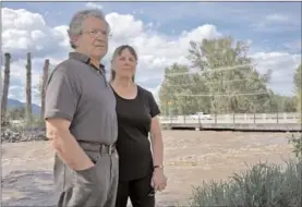  ?? NICK EAGLAND/Vancouver Sun/The Province ?? Eugene and Barb Filice stand on the bank of Mission Creek near Spiers Road, a short walk from their Kelowna home.