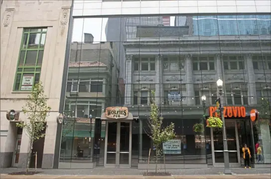  ?? Emily Matthews/Post-Gazette ?? Cafe Momentum will take over the vacant restaurant space that is the former location of Wolfie’s Pub in the JLL Center on Forbes Avenue near Market Square, Downtown.