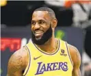  ?? RYAN SUN AP ?? Lakers superstar LeBron James appears recovered from the foot injury that plagued him last year. “He’s 100 percent healthy,” coach Darvin Ham said at camp.
