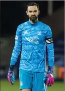  ??  ?? Dons captain Joe Lewis