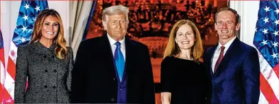  ?? AP ?? US President Donald Trump, first lady Melania Trump, Amy Coney Barrett and her husband Jesse pose at the White House. —