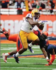  ??  ?? LSU wide receiver John Diarse (9) gains yards against Syracuse.