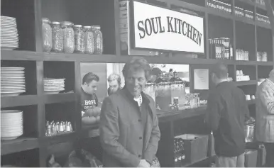  ??  ?? Jon Bon Jovi, inside his restaurant Soul Kitchen, created Diving into Hampton Water with French winemaker Gérard Bertrand. Bon Jovi says he was inspired by his son, former Notre Dame football player Jesse Bongiovi.