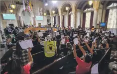  ?? Ringo H.W. Chiu Associated Press ?? PROTESTERS at the Los Angeles City Council meeting on Oct. 12.