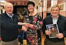  ?? (right) Photo by Sean Radley ?? Eilish Coakley, treasuer of the Marian Players Rathmore Panto Group (centre), presenting the proceeds of €20,500 to Hugh Ryan, Chairman of Kerry Parents Friends Associatio­n with Val Moynihan, Chairman of Marian Players.