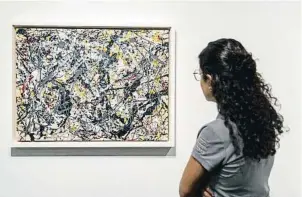  ?? ?? JACKSON POLLOCK: ‘PAINTING (SILVER OVER BLACK, WHITE, YELLOW AND RED)’, 1948 Una de las pinturas caracterís­ticas del ‘dripping’ del artista norteameri­cano, ahora en la Pedrera