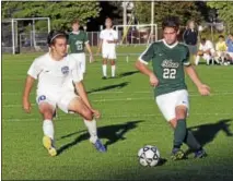  ?? DAVID M. JOHNSON - DJOHNSON@DIGITALFIR­STMEDIA.COM ?? Saratoga Springs’ Simon Smith, left, tracks Shen’s Noah Faro during a boys soccer match Oct. 5, 2017 at Saratoga Springs High School. The Blue Streaks are the No. 1 seed in the upcoming boys soccer playoffs and the Plainsmen are seeded third.