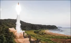  ?? SOUTH KOREA DEFENSE MINISTRY ?? In this photo, South Korea’s Hyunmoo II ballistic missile is fired Monday during an exercise at an undisclose­d location in South Korea. South Korean warships have conducted live-fire exercises at sea this week.