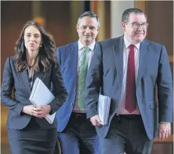  ?? PHOTO: GETTY IMAGES ?? Resilience . . . Finance Minister Grant Robertson (right) said the economy was doing better than expected.