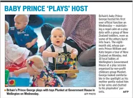  ??  ?? Britain’s Prince George plays with toys Plunket at Government House in Wellington on Wednesday. AFP PHOTO